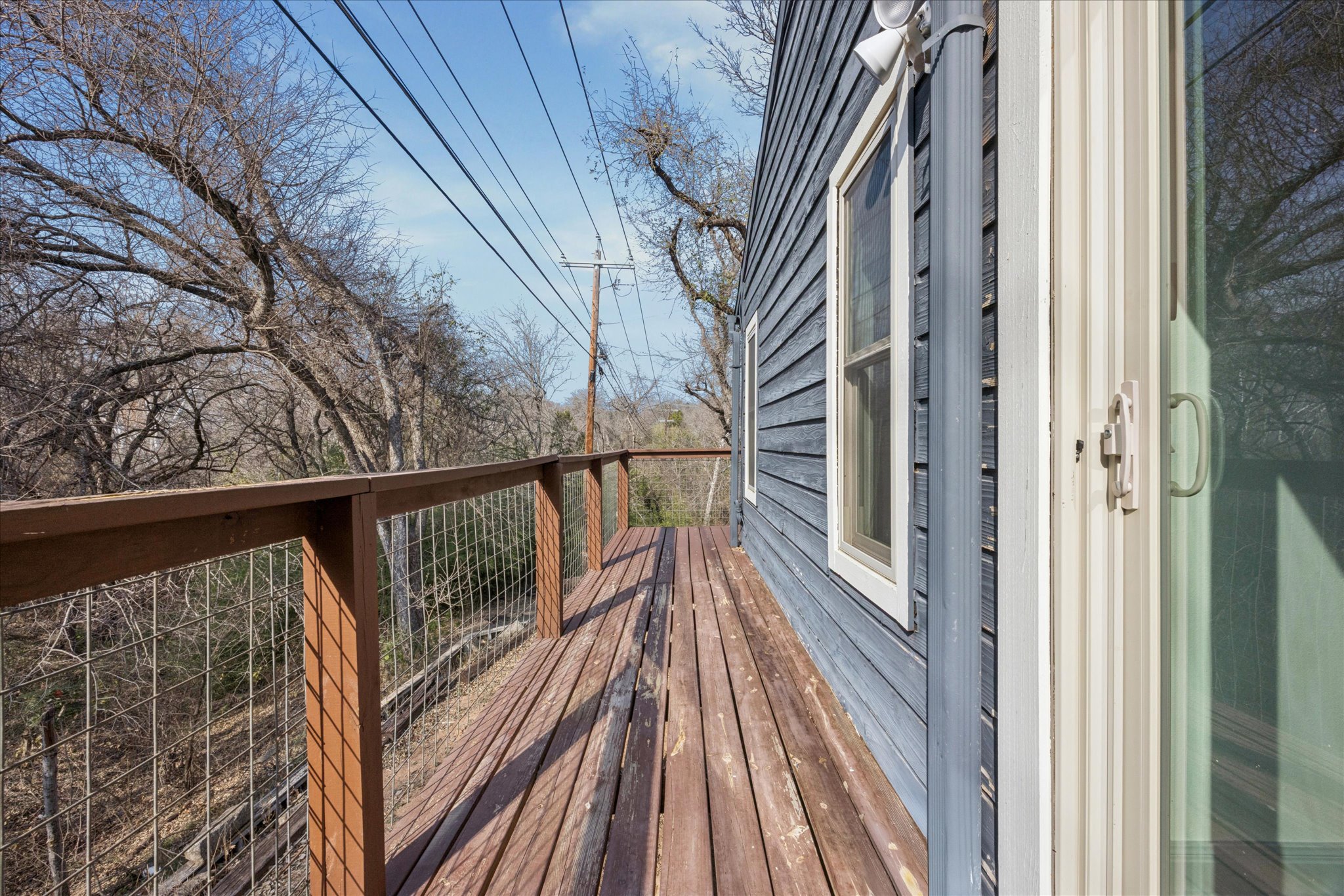 13918 Hummingbird Lane Austin, TX 78732 - Photo 22 of 32 a view of balcony with wooden floor