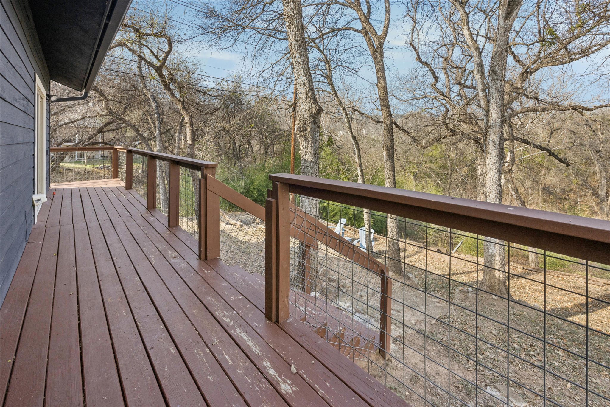 13918 Hummingbird Lane Austin, TX 78732 - Photo 24 of 32 a view of balcony with wooden floor