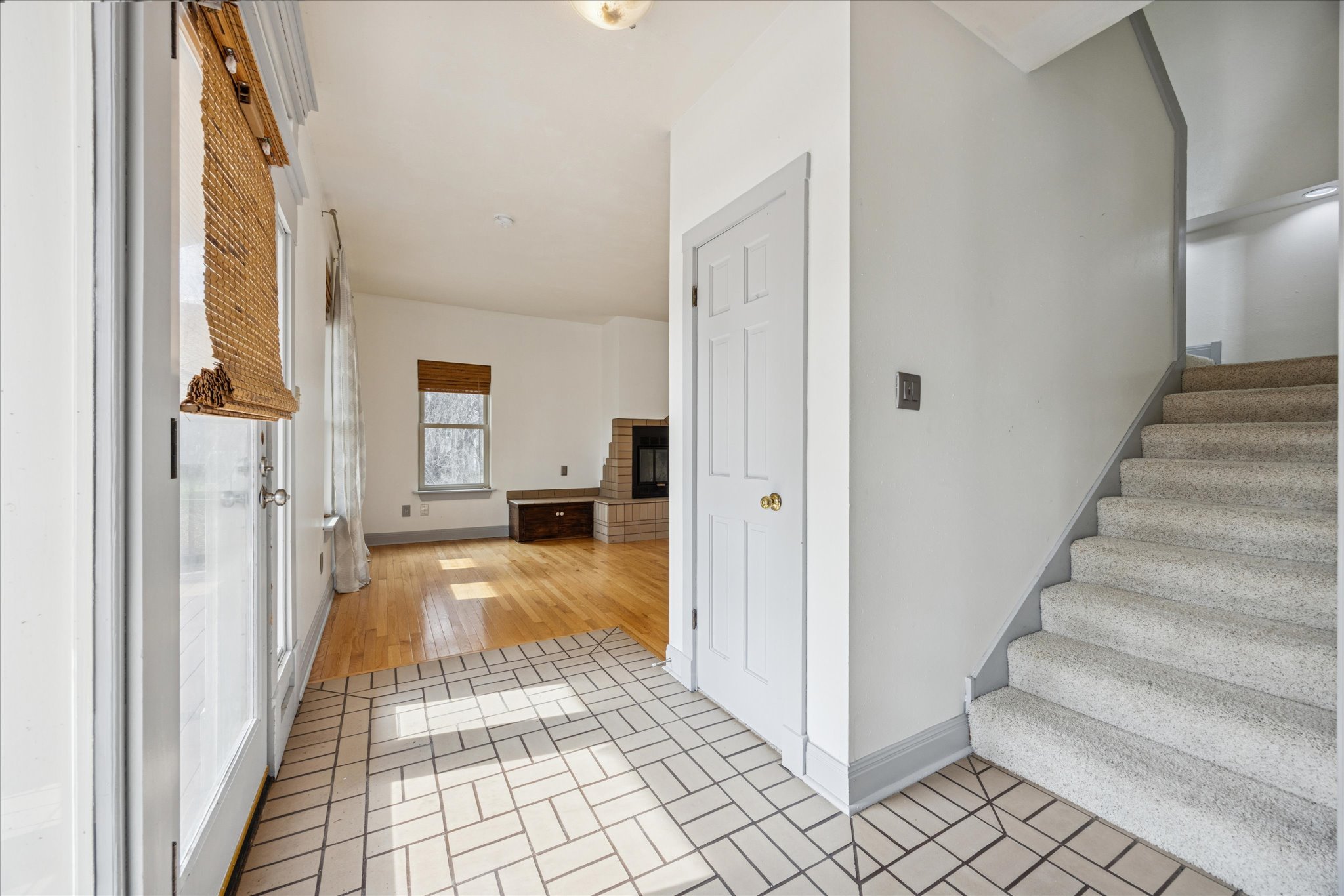 13918 Hummingbird Lane Austin, TX 78732 - Photo 7 of 32 a view of a hallway with wooden floor and staircase