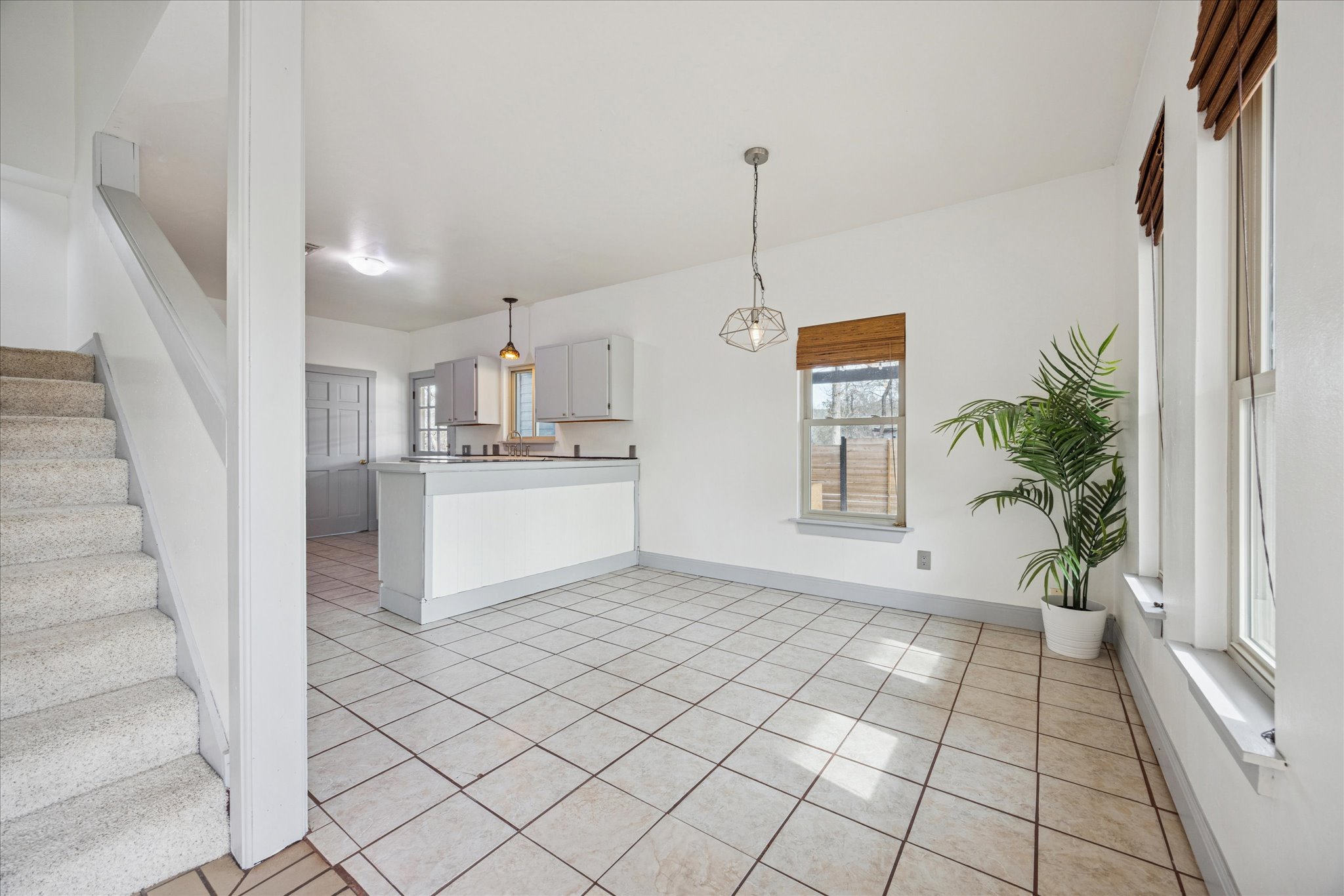 13918 Hummingbird Lane Austin, TX 78732 - Photo 8 of 32 a view of a kitchen with windows