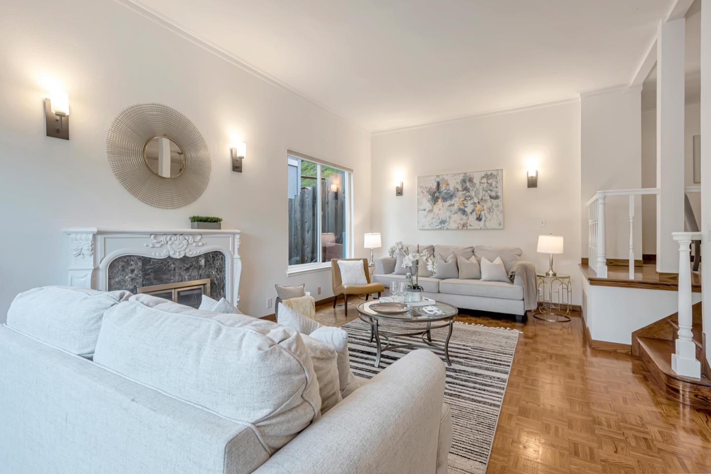 829 Helen Drive Millbrae, CA 94030 - Photo 1 of 1 a living room with furniture and a fireplace