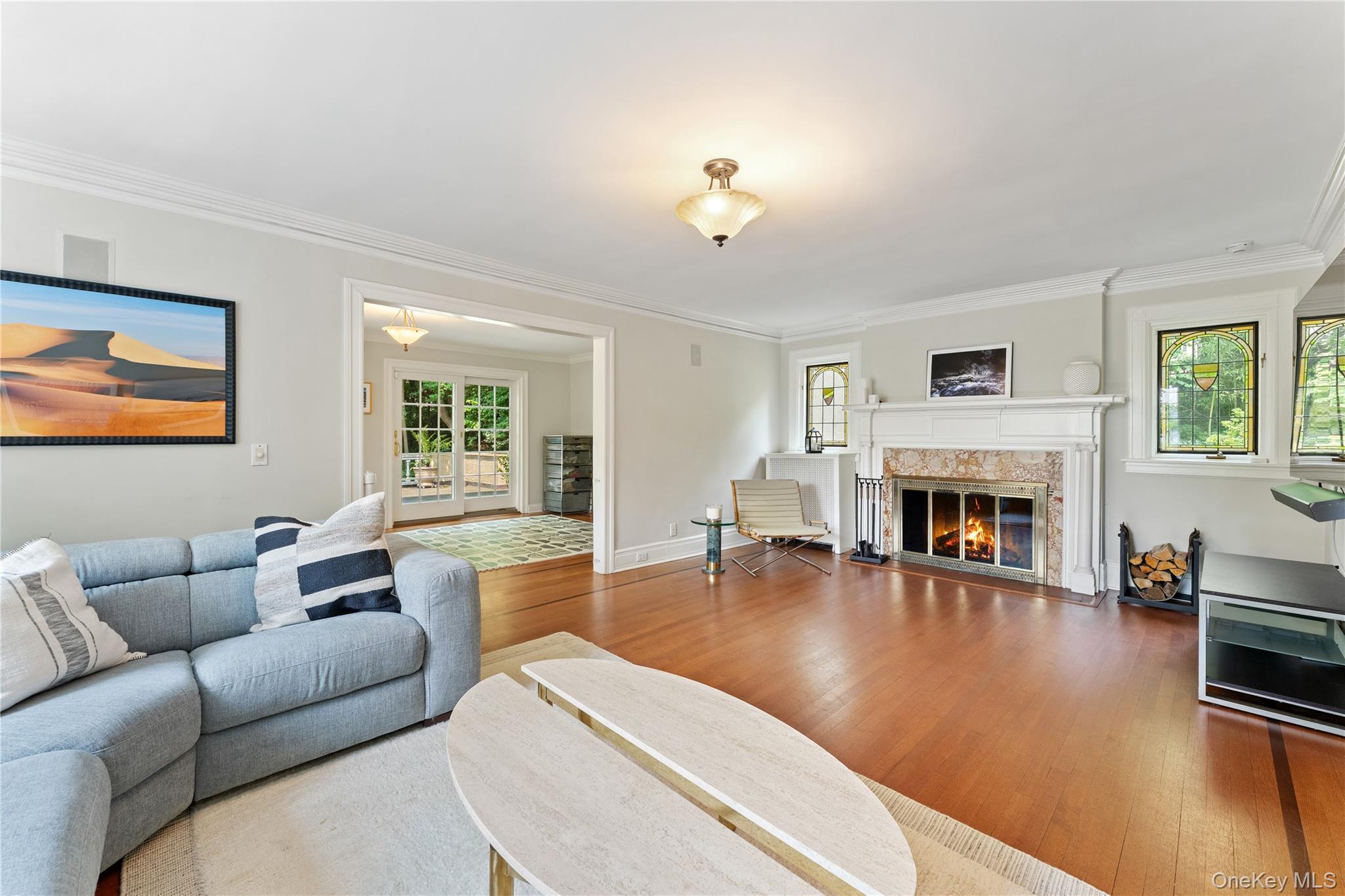 2 Dellwood Road Bronxville, NY 10708 - Photo 4 of 36 Living Room view featuring wood-burning fireplace and hardwood floors.
