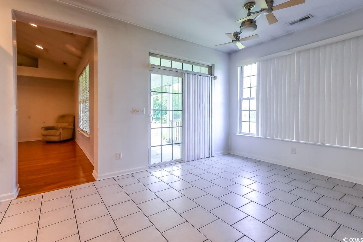 2191 Jasmine Road Loris, SC 29569 - Photo 12 of 40 Unfurnished room featuring a ceiling fan and baseboards