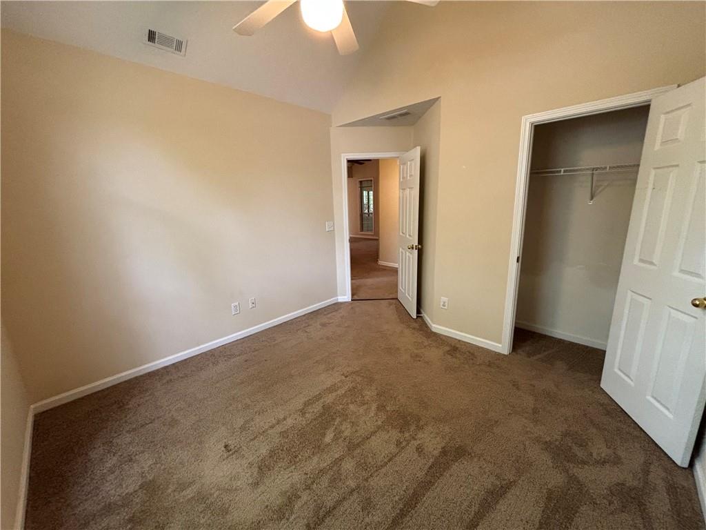 170 Gibson Way Covington, GA 30016 - Photo 11 of 50 an empty room with a empty space