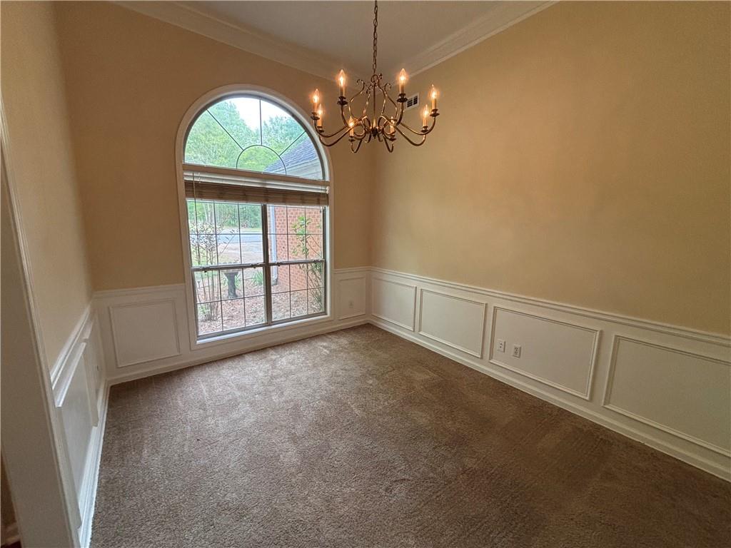 170 Gibson Way Covington, GA 30016 - Photo 23 of 50 a view of an empty room with a window