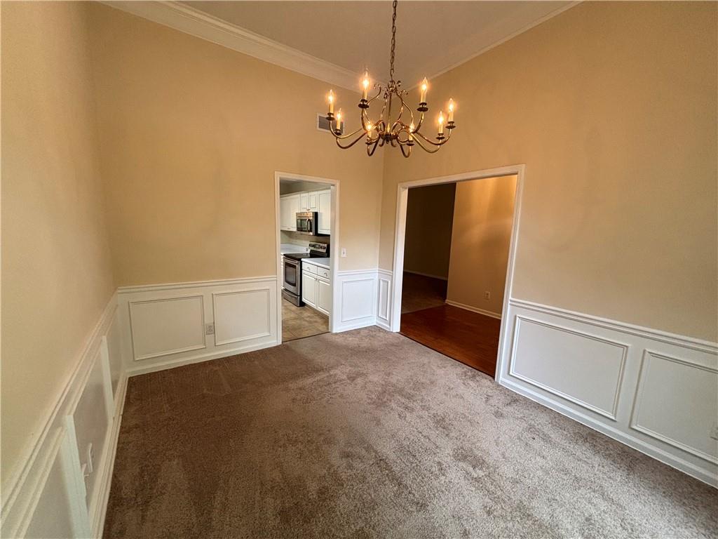 170 Gibson Way Covington, GA 30016 - Photo 24 of 50 a view of a livingroom with a chandelier