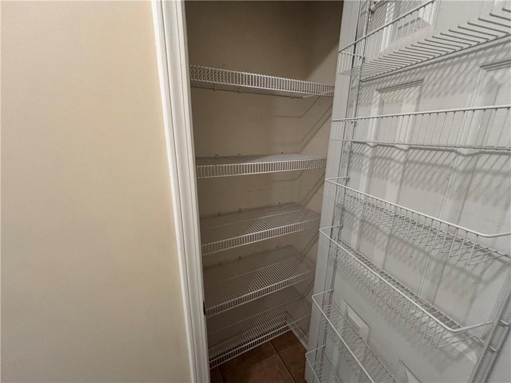 170 Gibson Way Covington, GA 30016 - Photo 39 of 50 a view of walk in closet with empty racks
