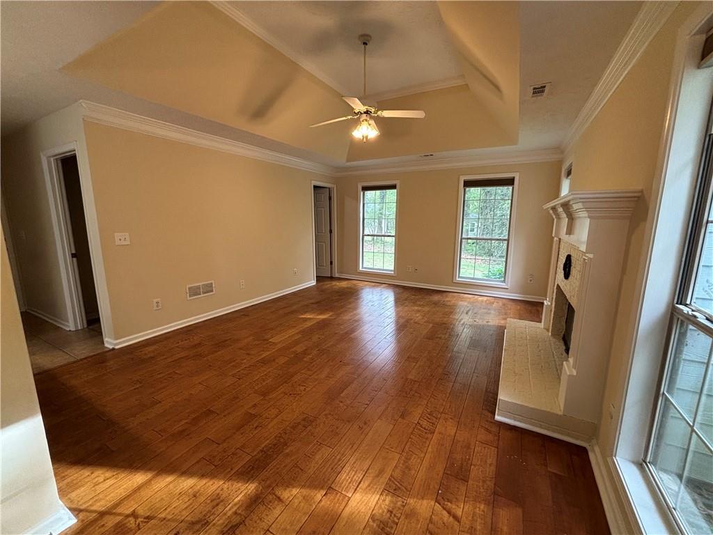 170 Gibson Way Covington, GA 30016 - Photo 42 of 50 a view of livingroom with hardwood floor and a ceiling fan