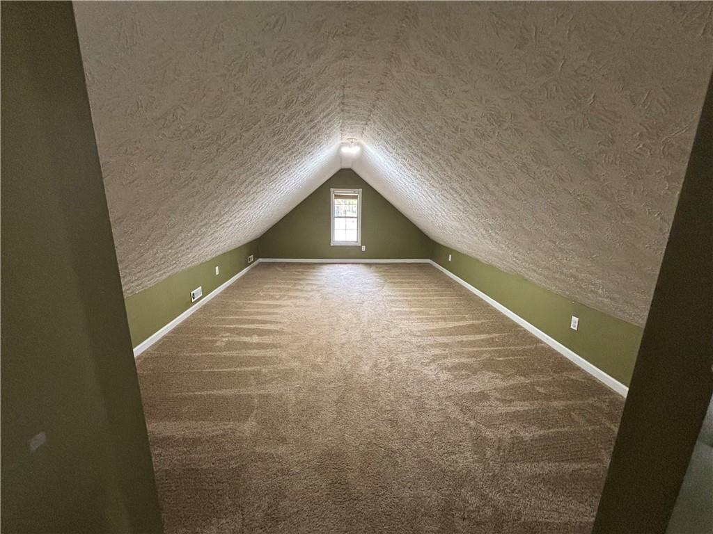 170 Gibson Way Covington, GA 30016 - Photo 48 of 50 a view of empty room with wooden floor