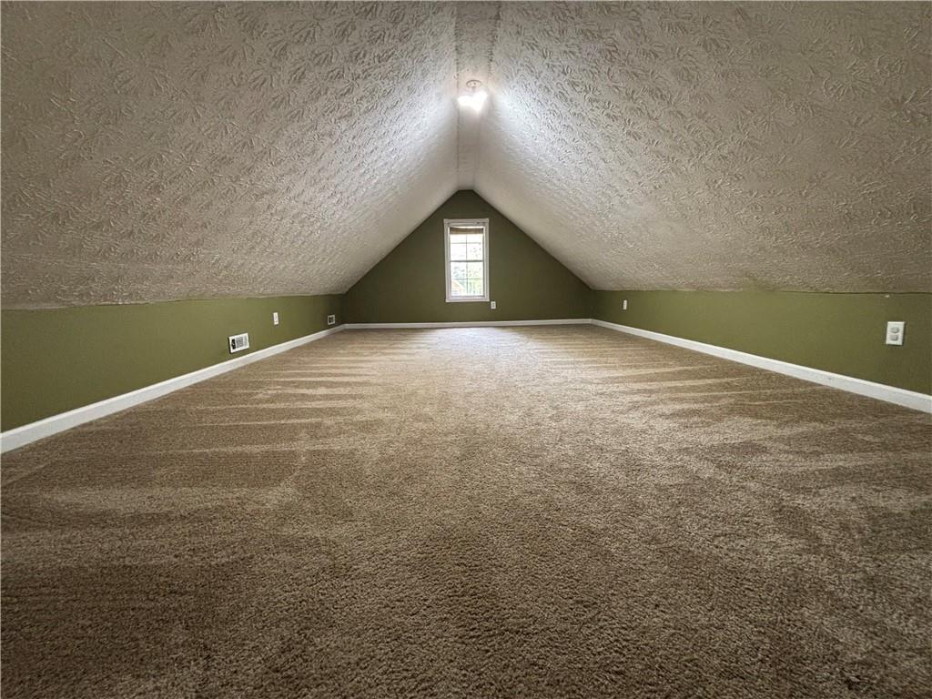 170 Gibson Way Covington, GA 30016 - Photo 50 of 50 a view of empty room with wooden floor