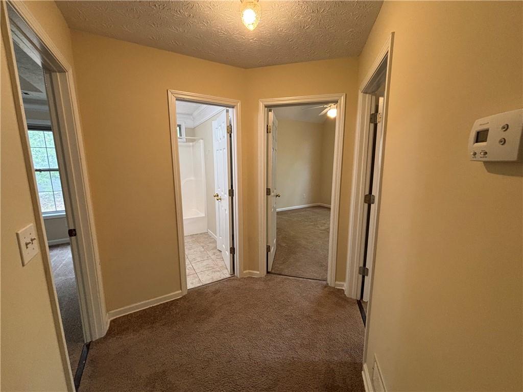 170 Gibson Way Covington, GA 30016 - Photo 7 of 50 a view of a bathroom from a hallway