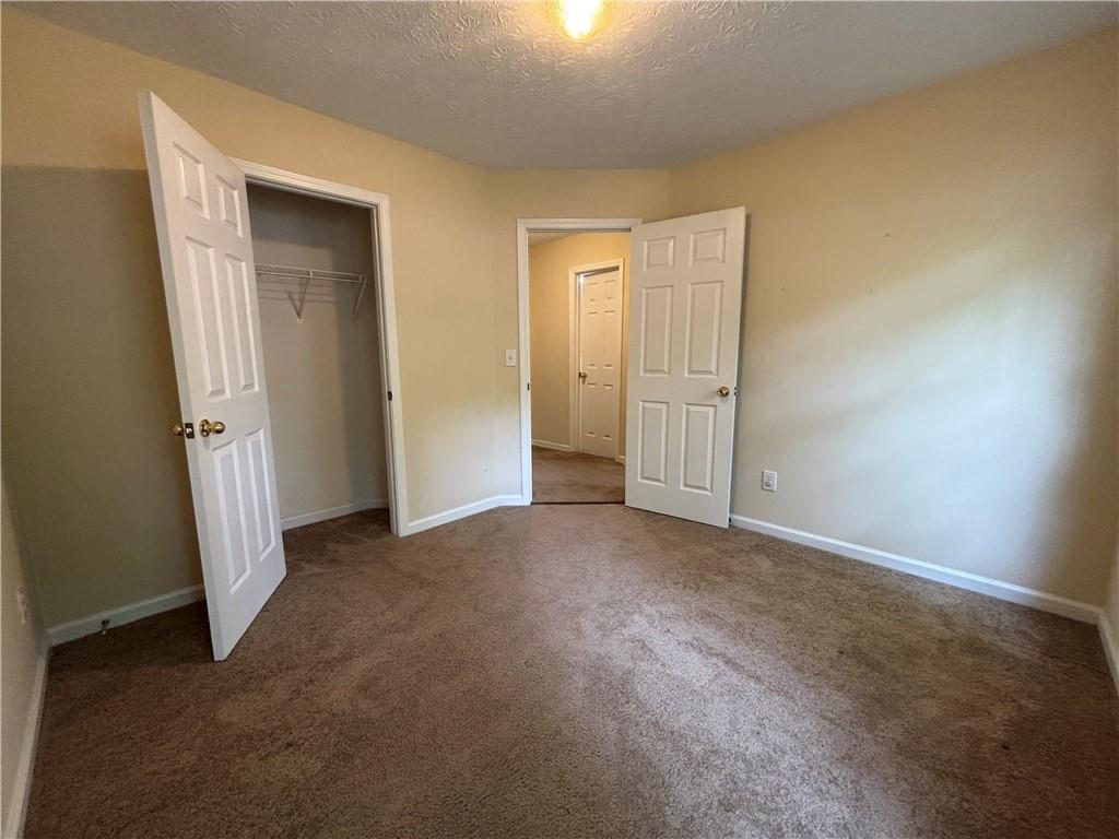170 Gibson Way Covington, GA 30016 - Photo 9 of 50 an empty room with closet area