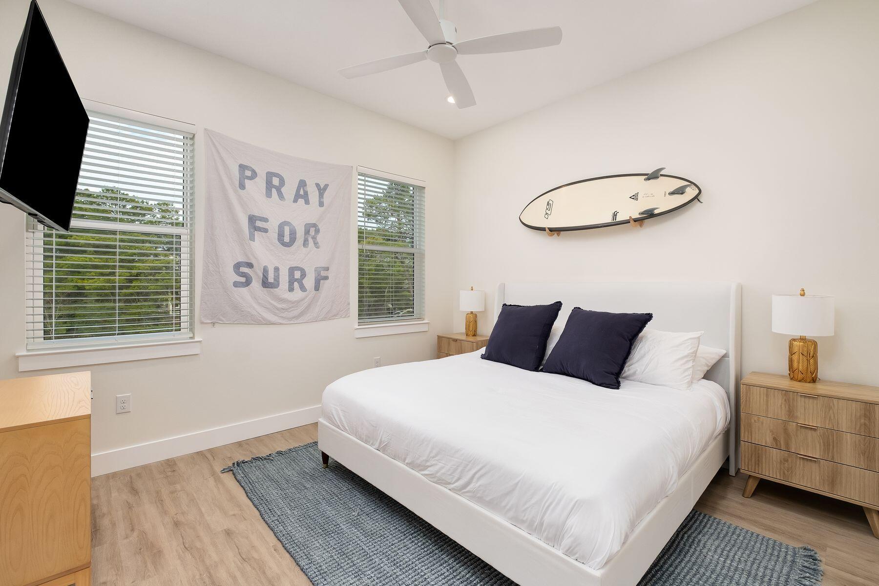 221 Hillcrest Road Santa Rosa Beach, FL 32459 - Photo 26 of 52 a bedroom with a large bed and a window