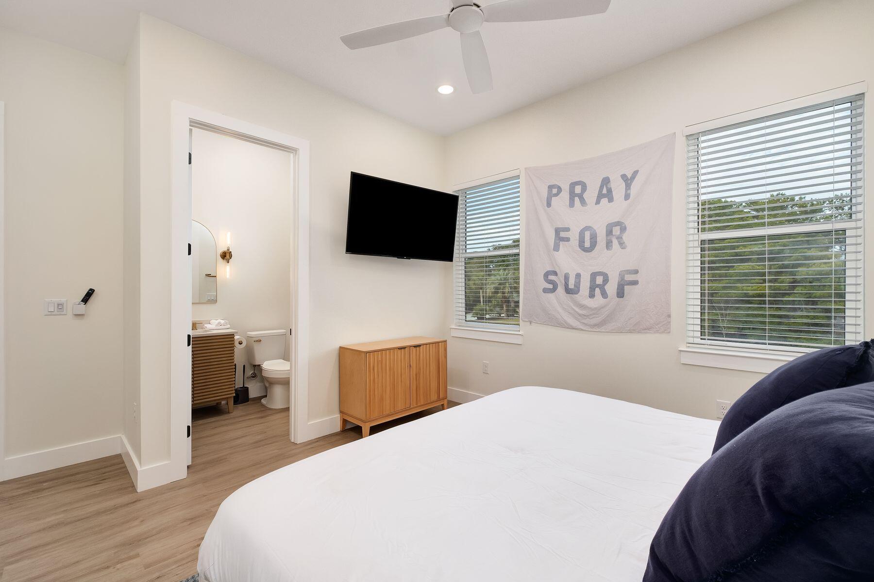 221 Hillcrest Road Santa Rosa Beach, FL 32459 - Photo 27 of 52 a bedroom with a bed and a television