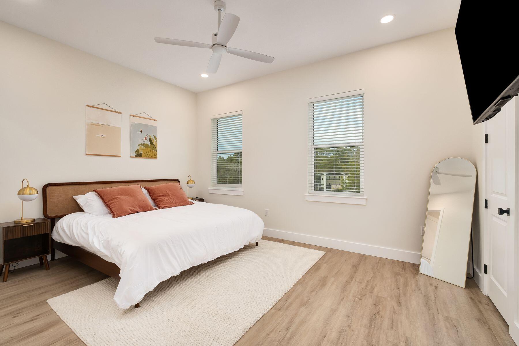 221 Hillcrest Road Santa Rosa Beach, FL 32459 - Photo 35 of 52 a bedroom with a bed flat screen tv and window
