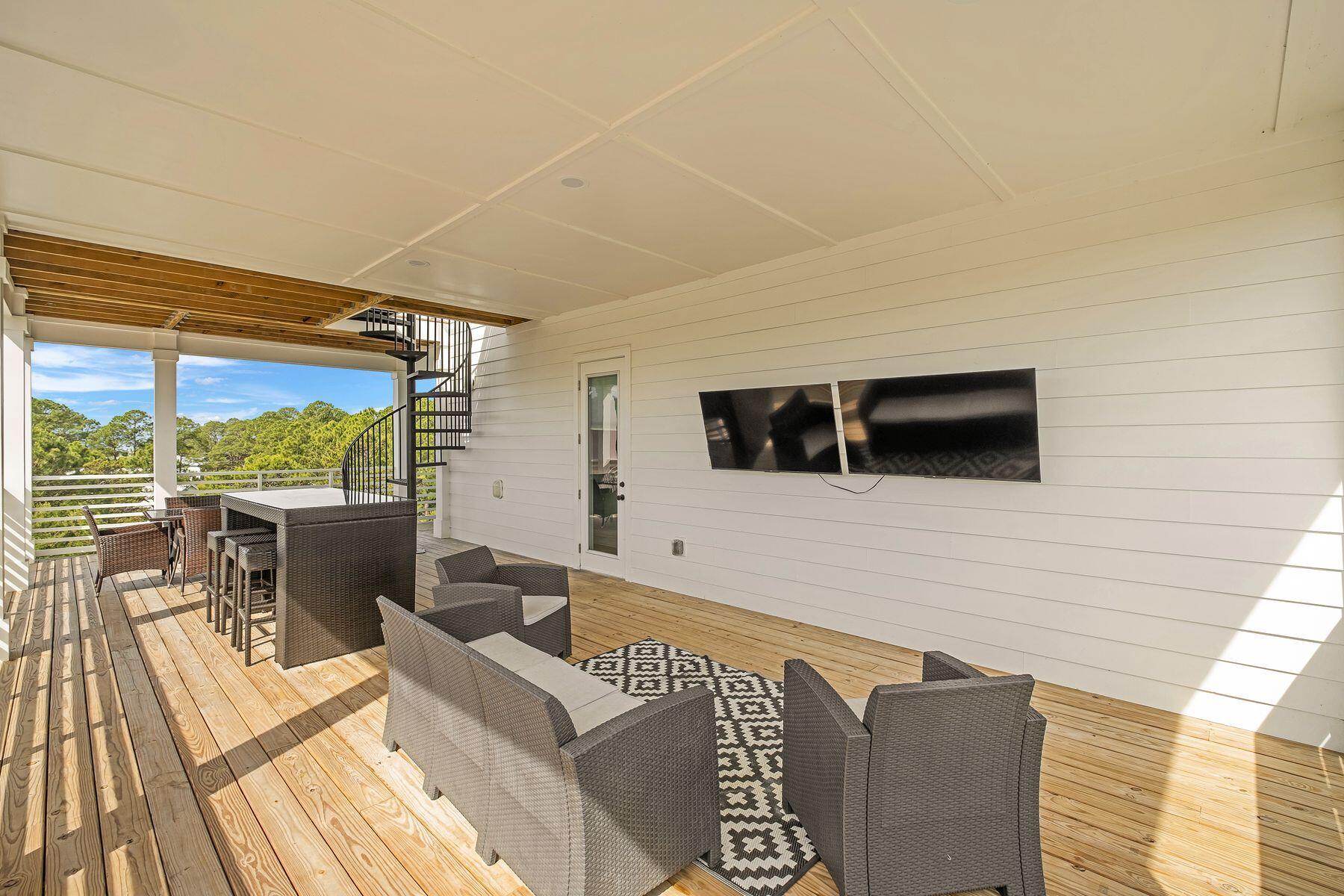 221 Hillcrest Road Santa Rosa Beach, FL 32459 - Photo 40 of 52 a outdoor living space with furniture