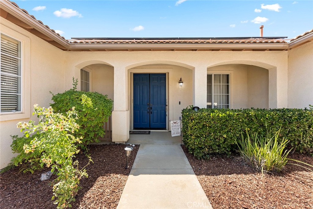 17229 Prairie Mile Road Ramona, CA 92065 - Photo 2 of 32 a view of a house with potted plants