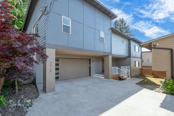 a view of a house with a garage