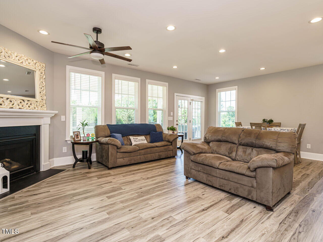 2909 Thurman Dairy Loop Wake Forest, NC 27587 - Photo 12 of 46 a living room with furniture and a fireplace