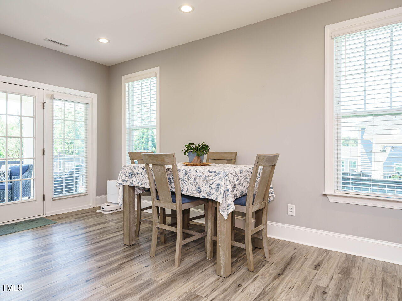 2909 Thurman Dairy Loop Wake Forest, NC 27587 - Photo 14 of 46 a dining room with furniture window wooden floor