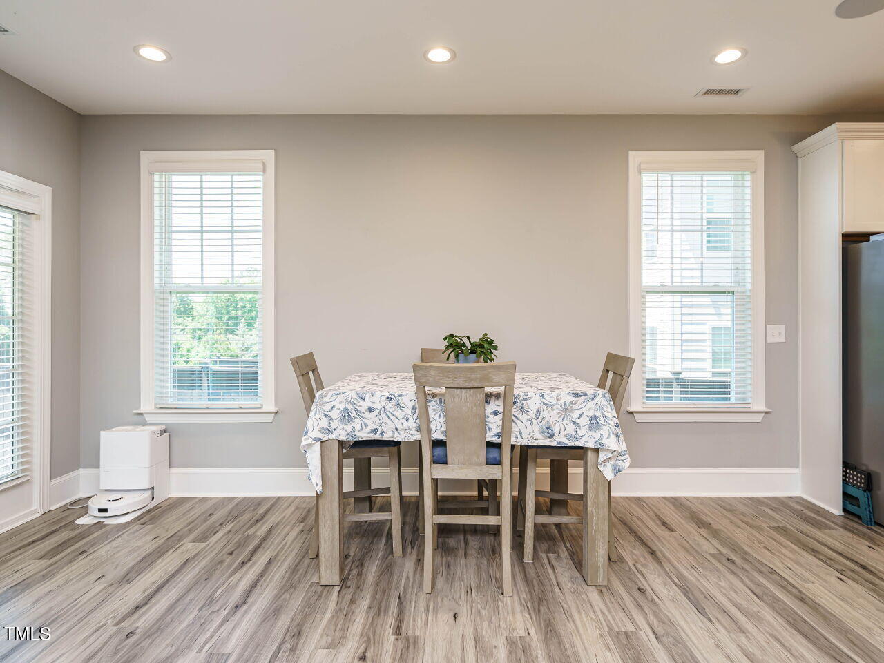 2909 Thurman Dairy Loop Wake Forest, NC 27587 - Photo 15 of 46 a view of a dining room with furniture and wooden floor
