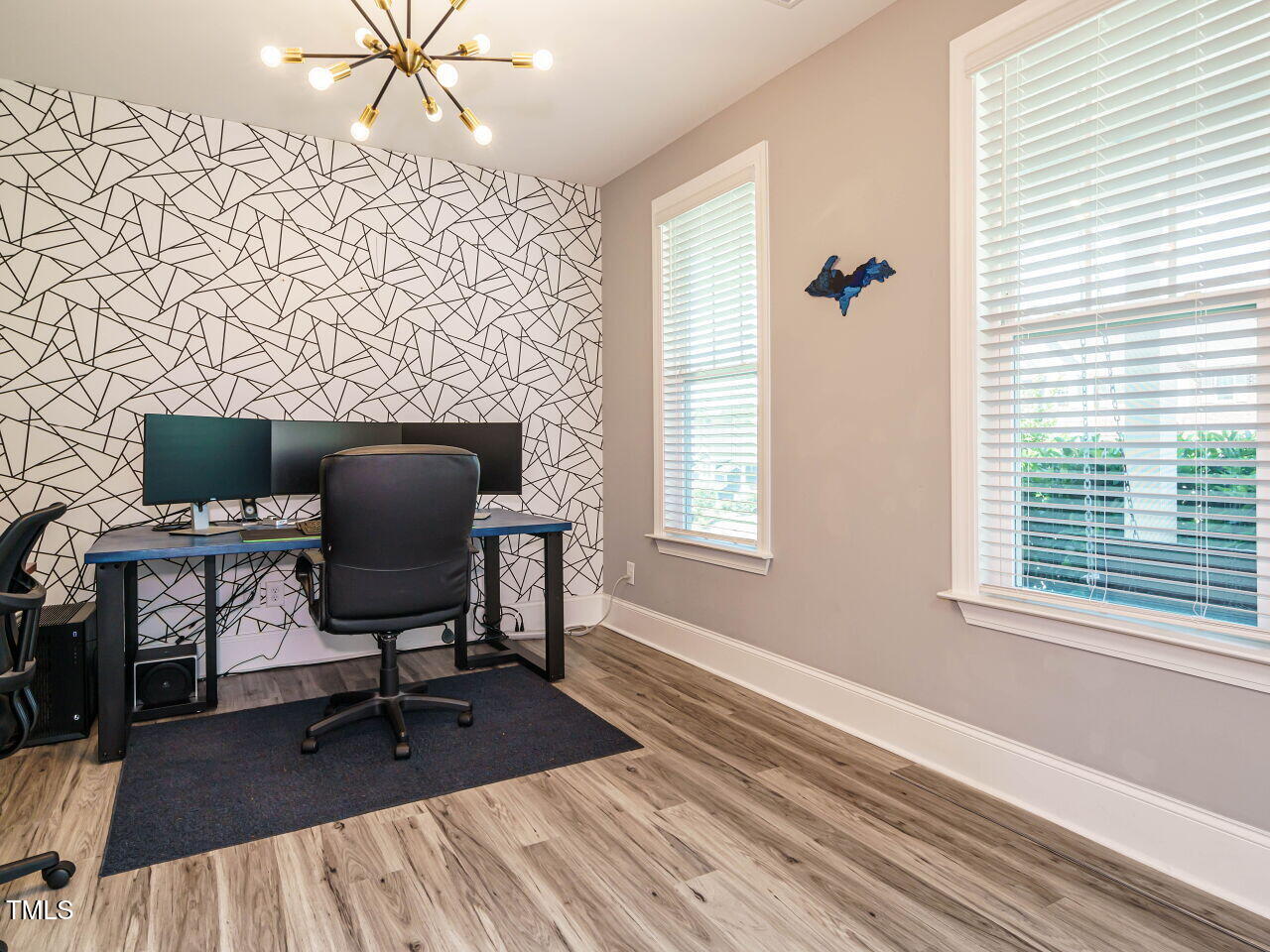 2909 Thurman Dairy Loop Wake Forest, NC 27587 - Photo 17 of 46 a view of a workspace with furniture and a window