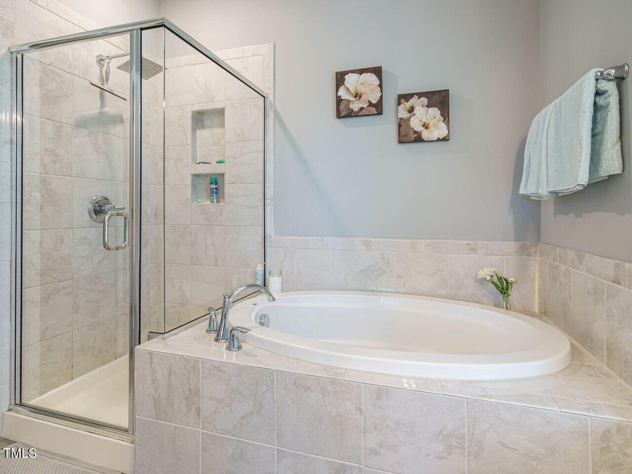 2909 Thurman Dairy Loop Wake Forest, NC 27587 - Photo 22 of 46 a white bath tub sitting next to a shower