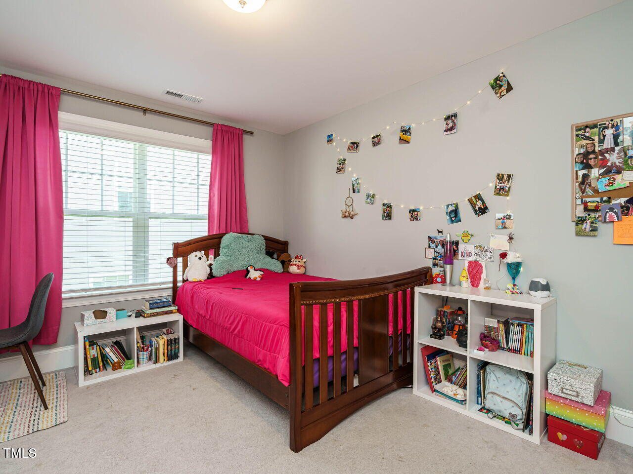 2909 Thurman Dairy Loop Wake Forest, NC 27587 - Photo 25 of 46 a bedroom with a bed and a window