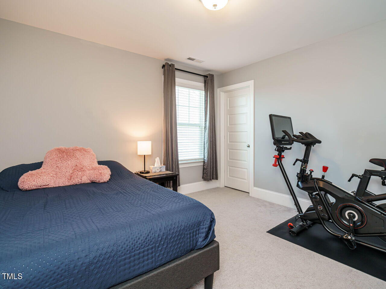 2909 Thurman Dairy Loop Wake Forest, NC 27587 - Photo 28 of 46 a bedroom with bed and a window