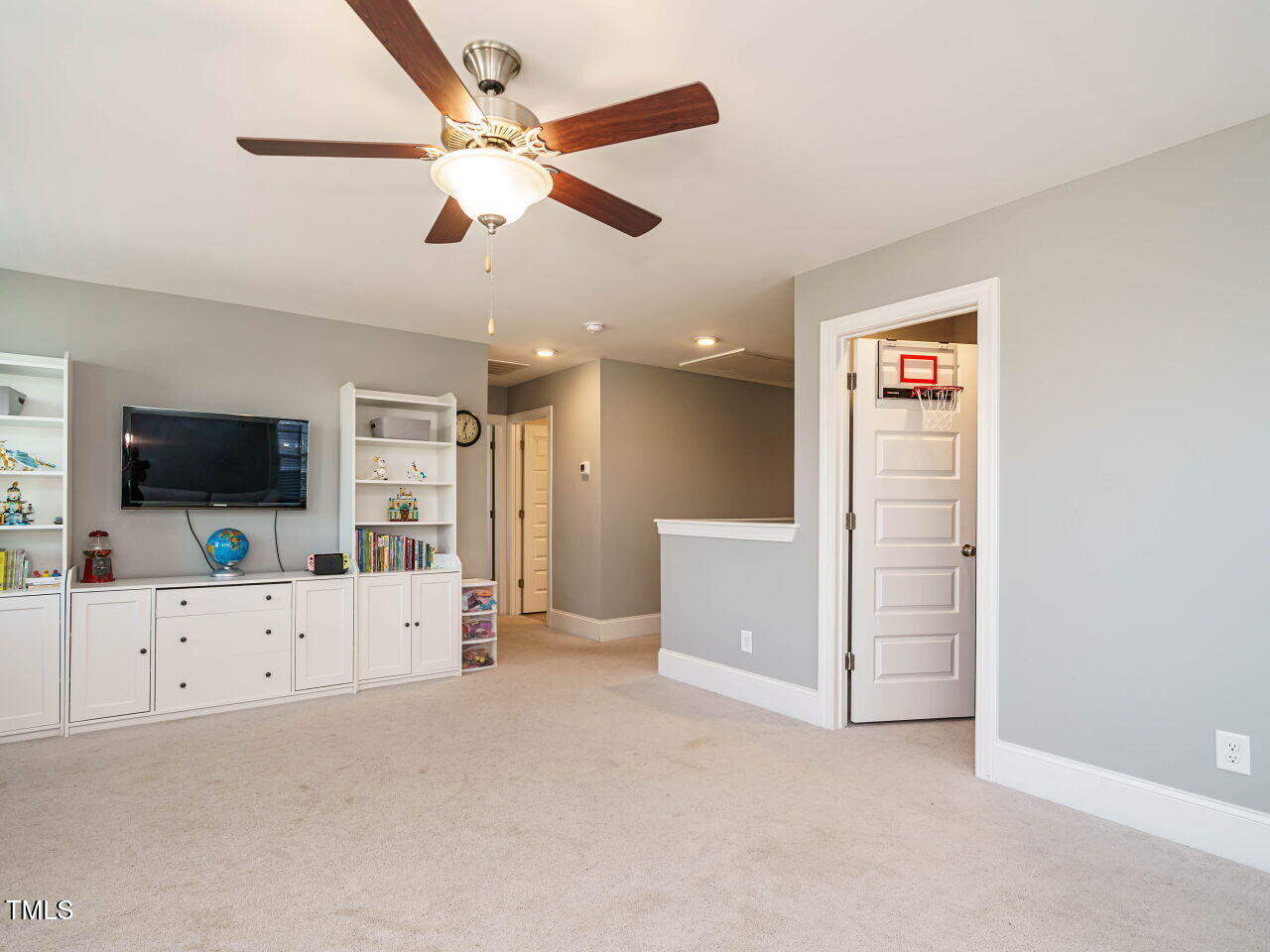 2909 Thurman Dairy Loop Wake Forest, NC 27587 - Photo 31 of 46 a view of a livingroom with furniture and a flat screen tv