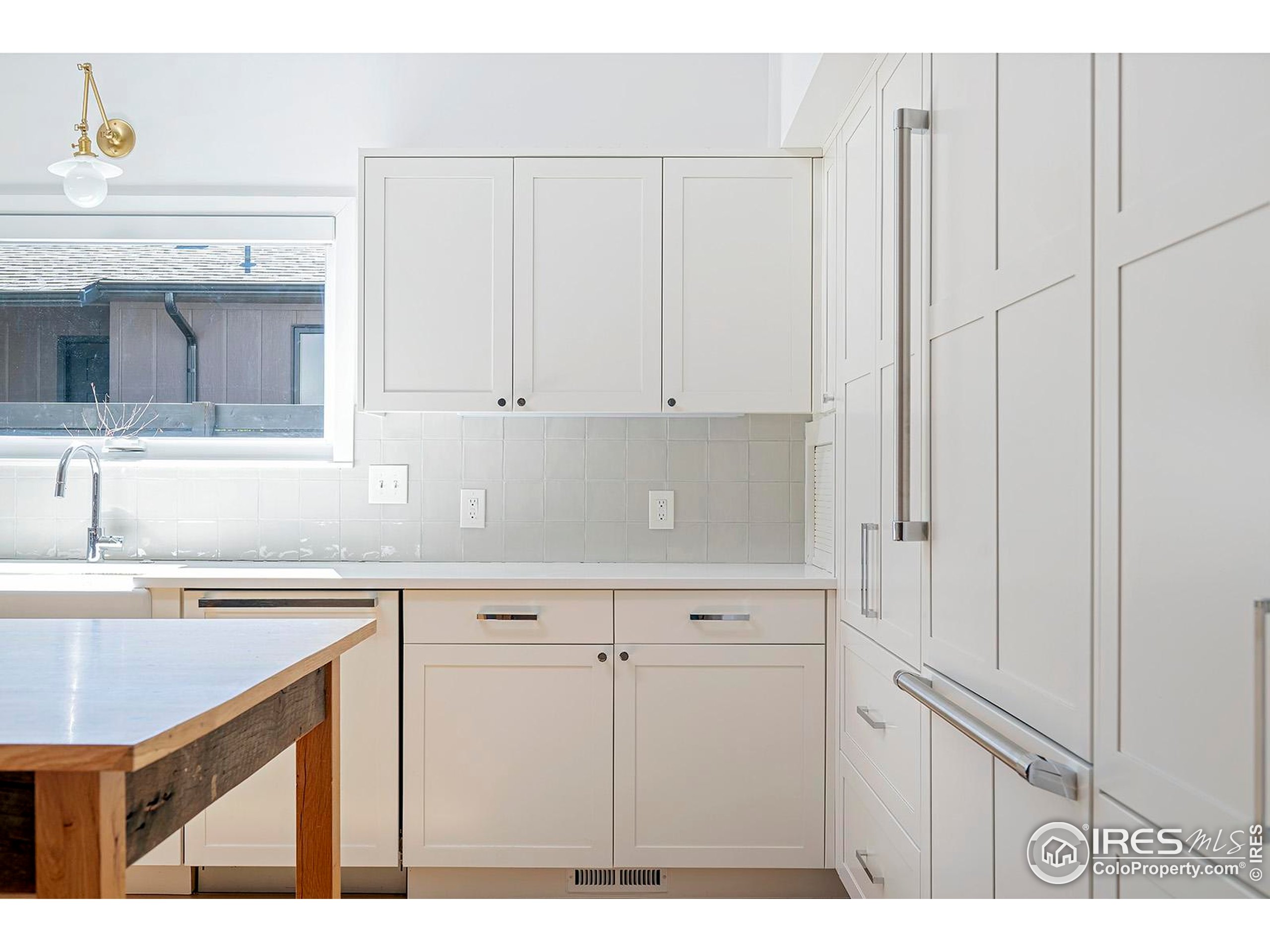 1707 Grape Avenue Boulder, CO 80304 - Photo 11 of 35 a view of cabinets with wooden floor