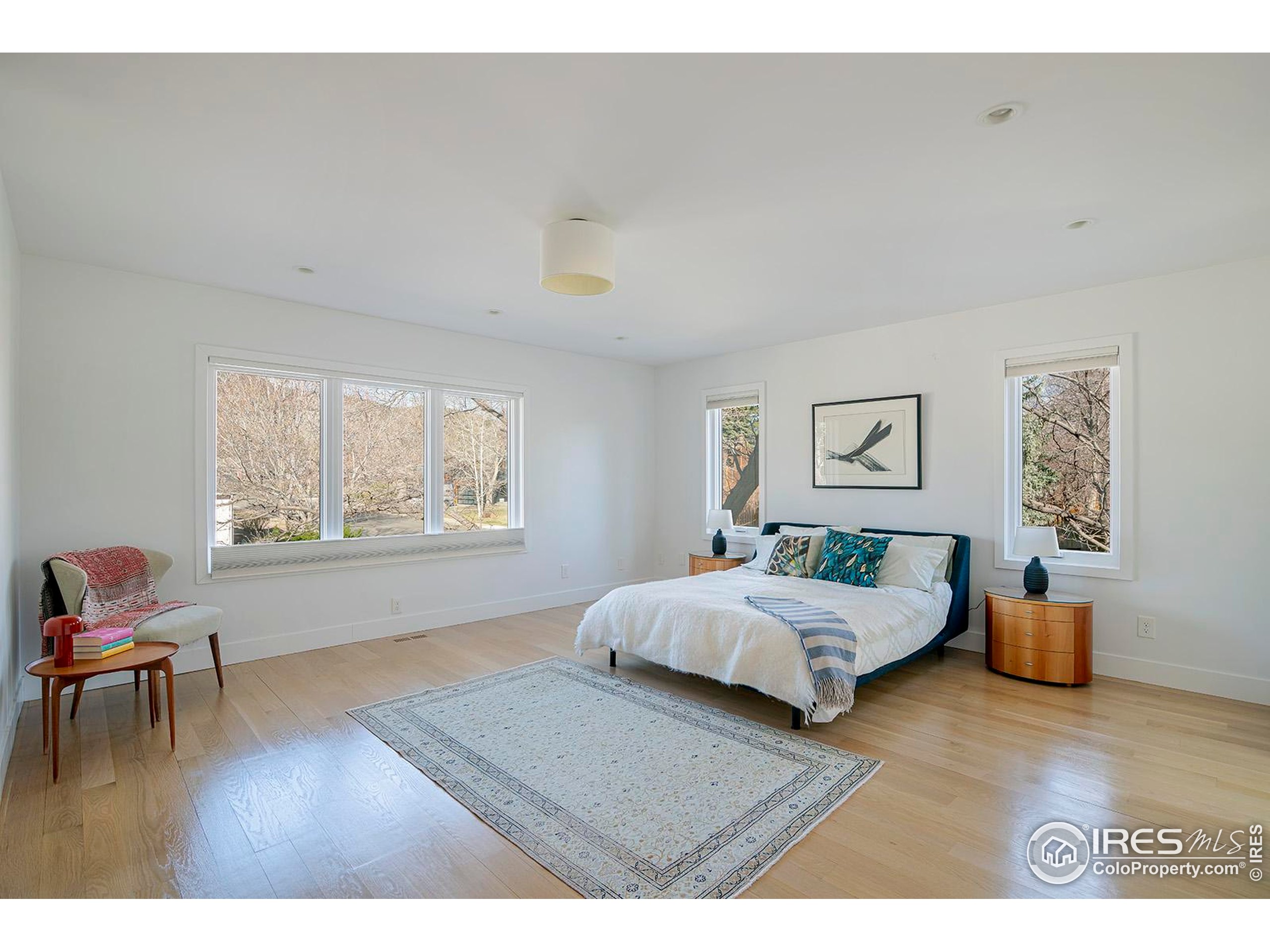 1707 Grape Avenue Boulder, CO 80304 - Photo 14 of 35 a bedroom with a bed and a couch