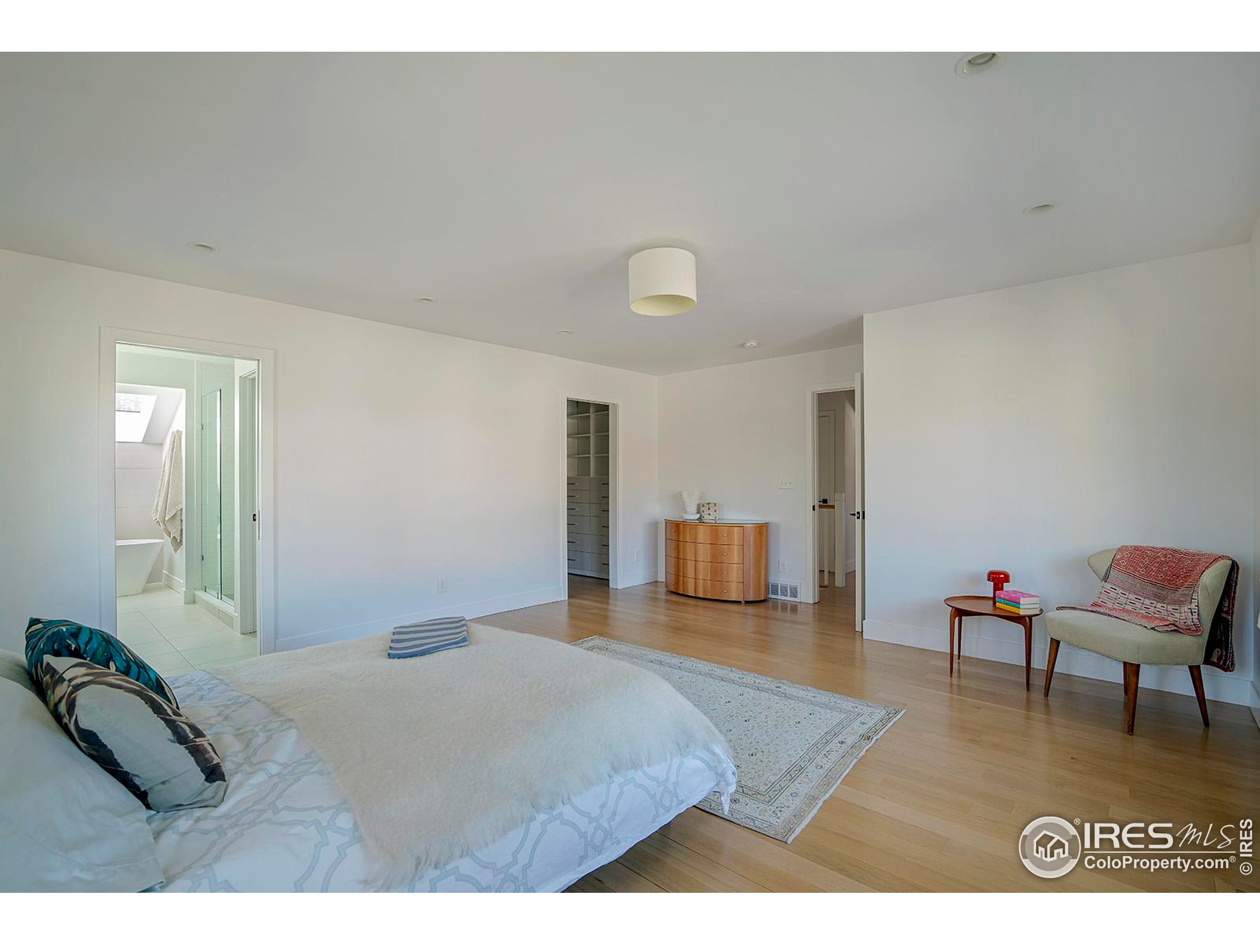 1707 Grape Avenue Boulder, CO 80304 - Photo 15 of 35 a bedroom with a bed and furniture