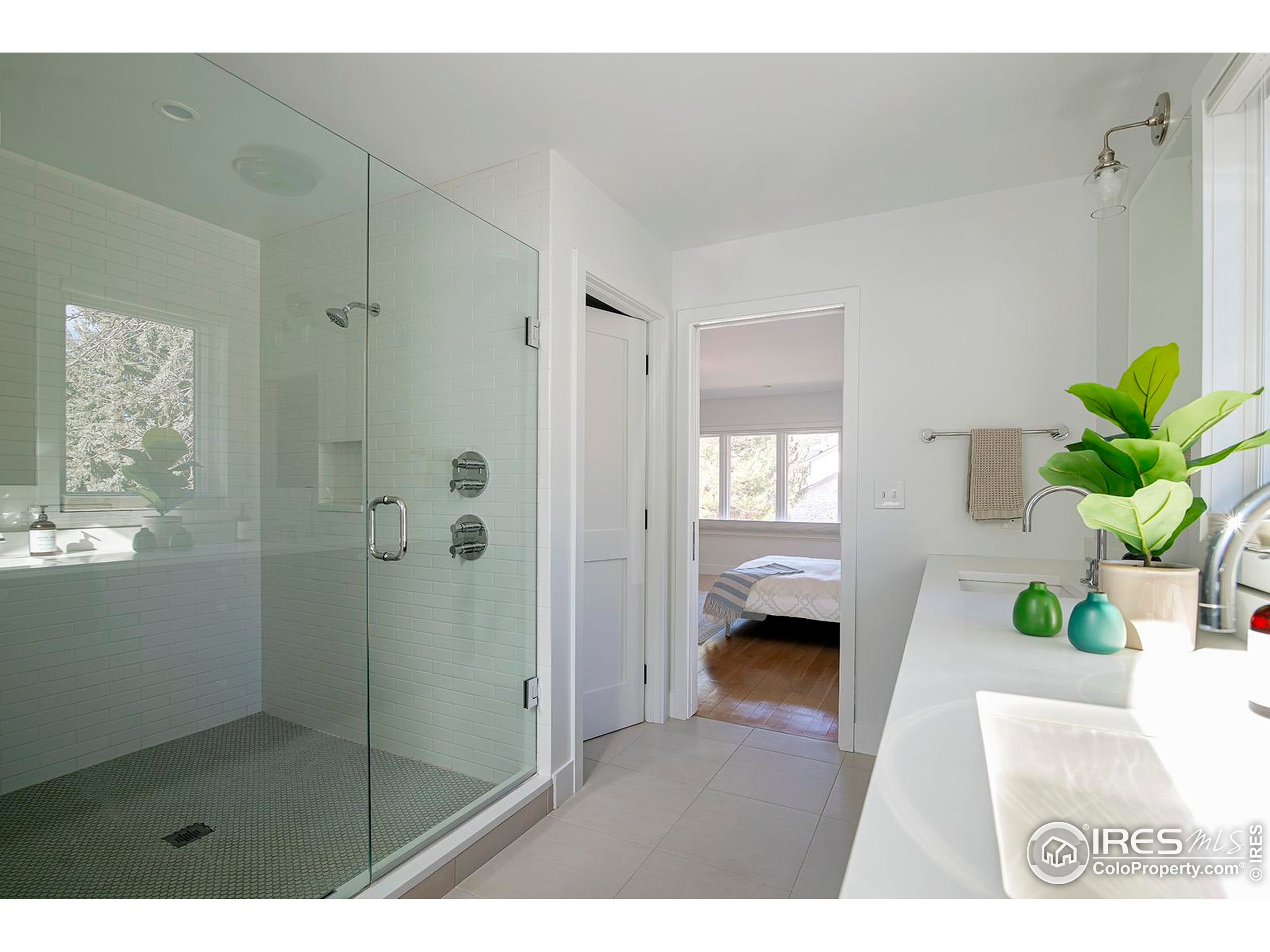 1707 Grape Avenue Boulder, CO 80304 - Photo 19 of 35 a bedroom with a bed and a window