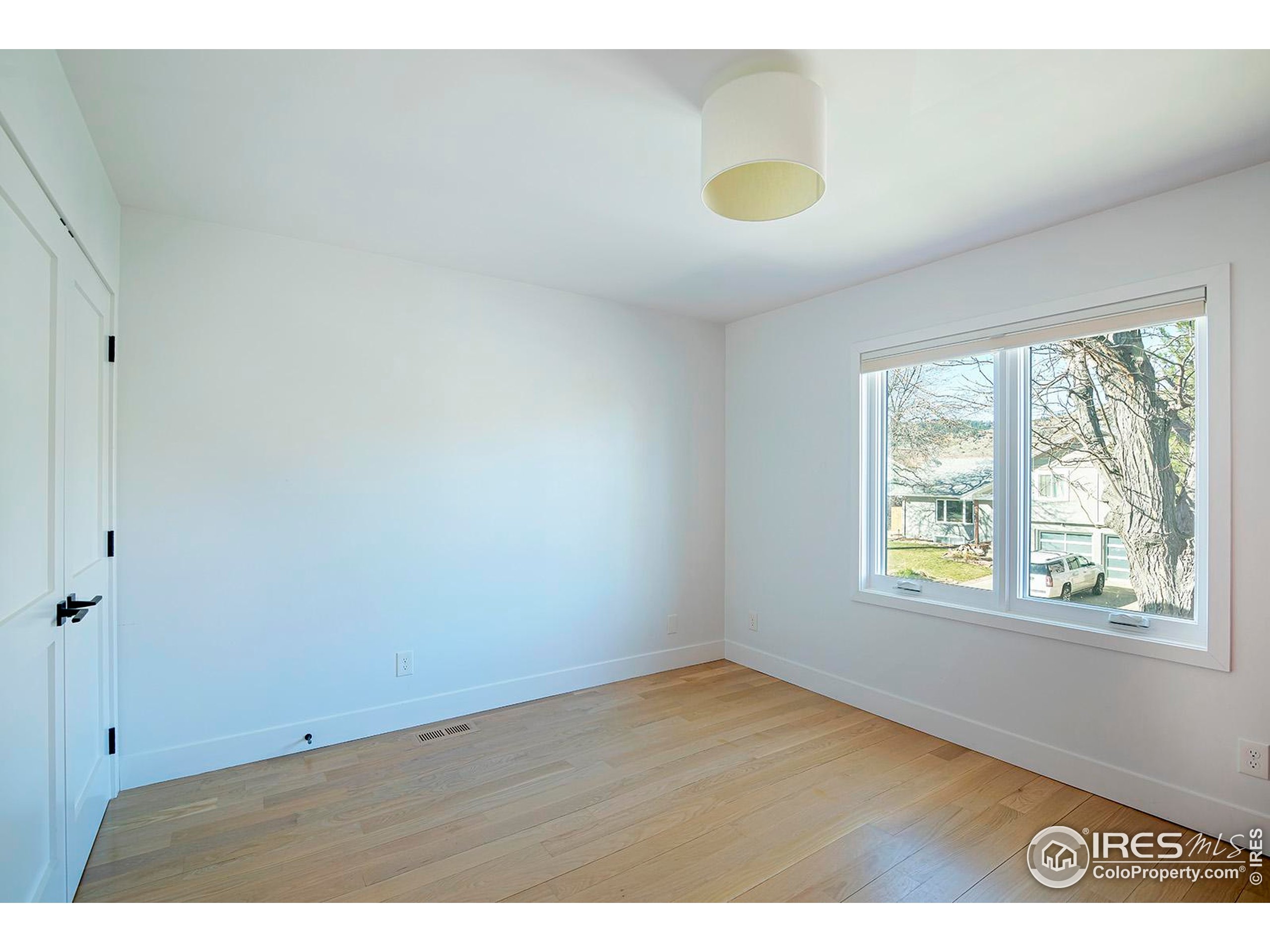 1707 Grape Avenue Boulder, CO 80304 - Photo 23 of 35 a view of an empty room and window