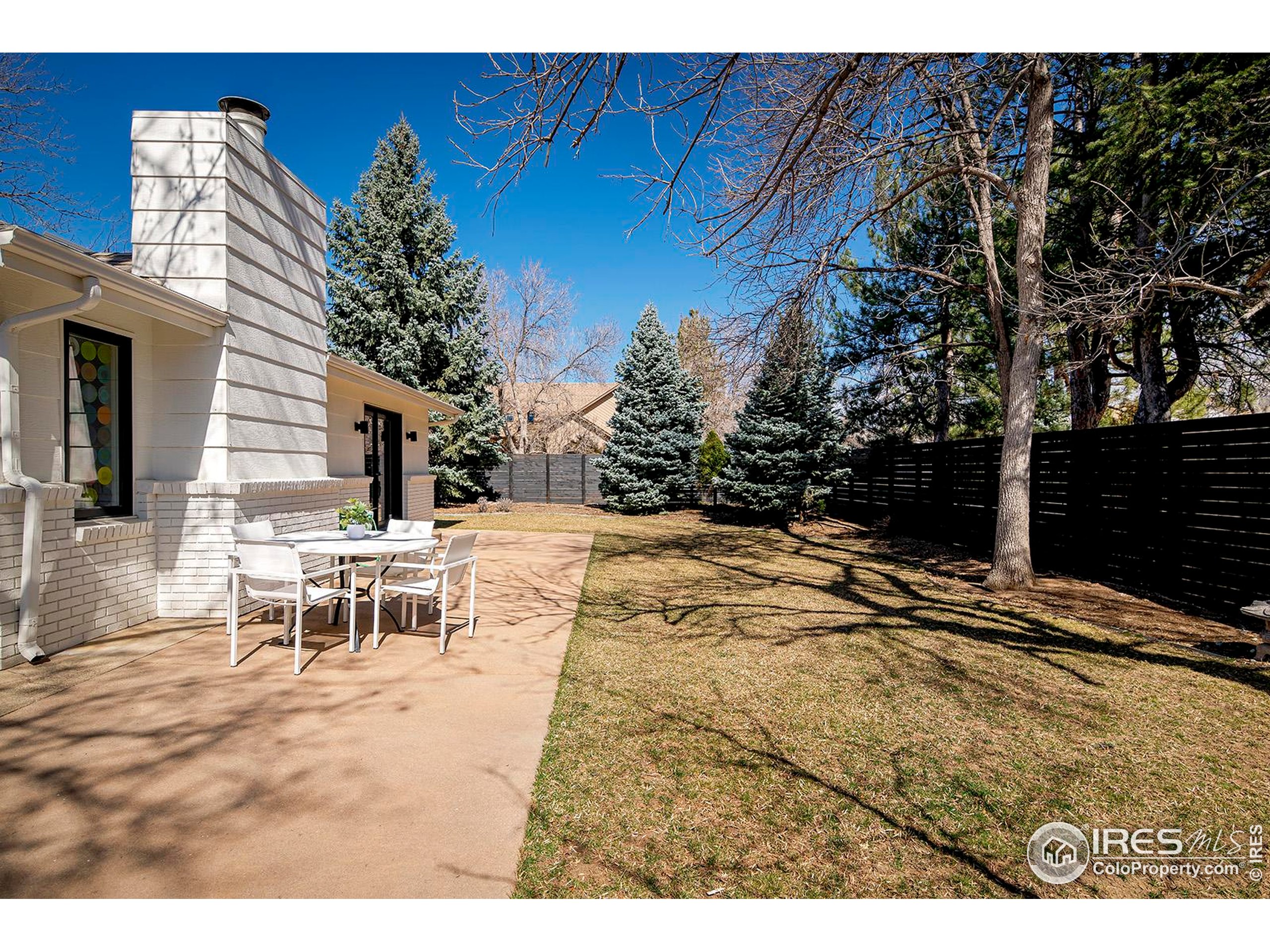 1707 Grape Avenue Boulder, CO 80304 - Photo 33 of 35 a view of a backyard with sitting area