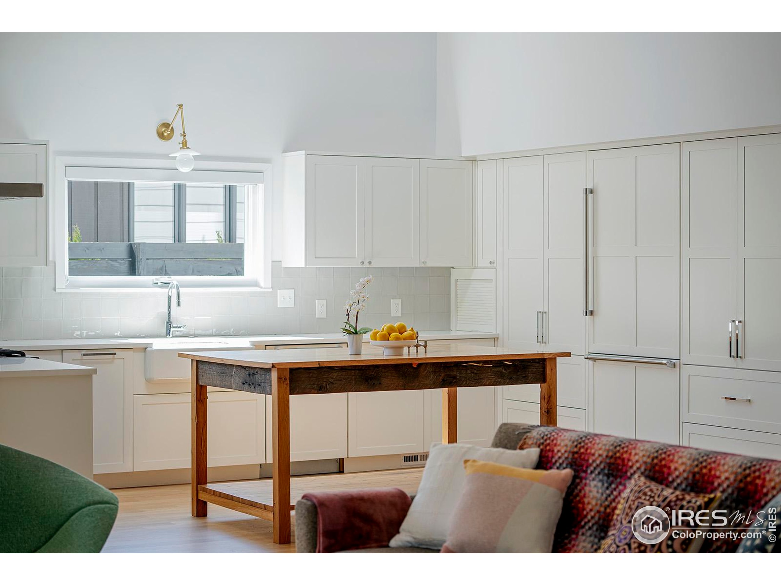 1707 Grape Avenue Boulder, CO 80304 - Photo 10 of 35 a kitchen with stainless steel appliances granite countertop a sink and white cabinets