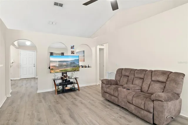 a living room with furniture and a couch
