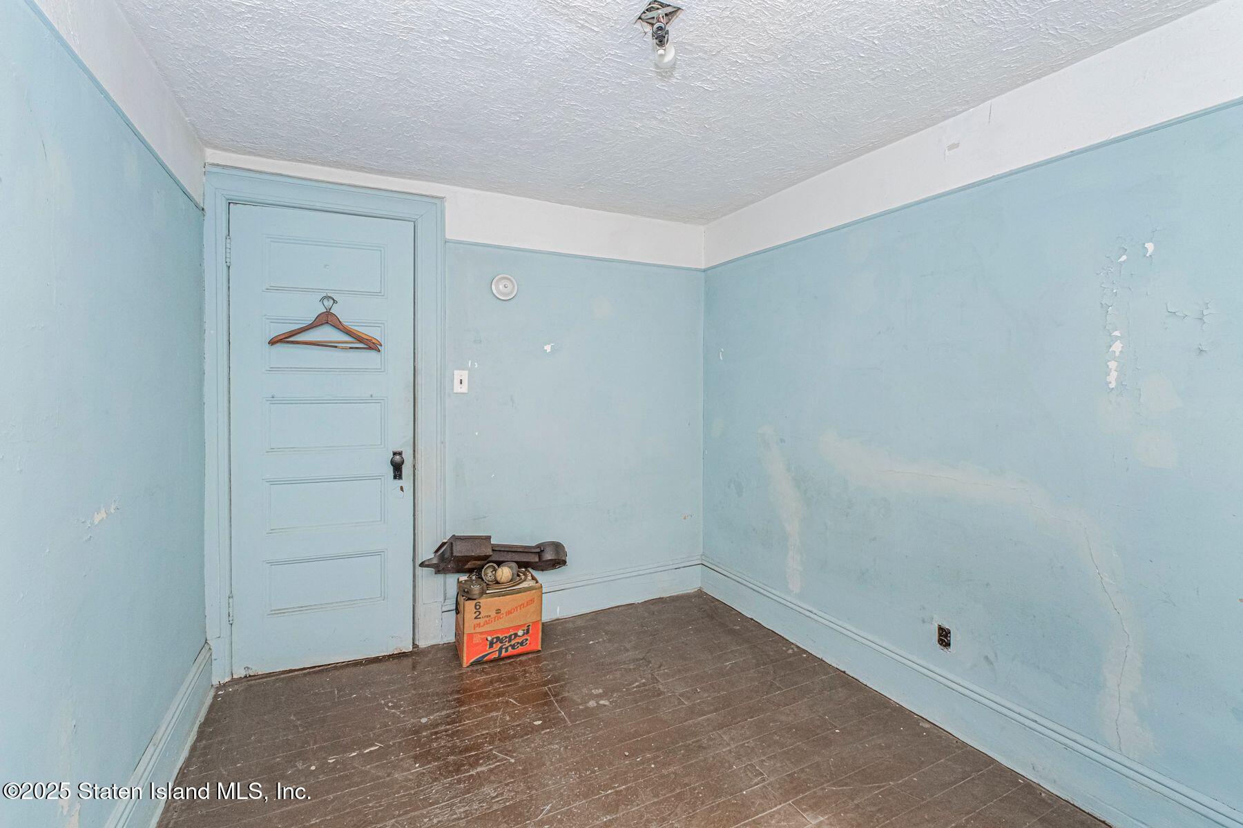 316 Sherman Street Brooklyn, NY 11218 - Photo 17 of 26 an empty room