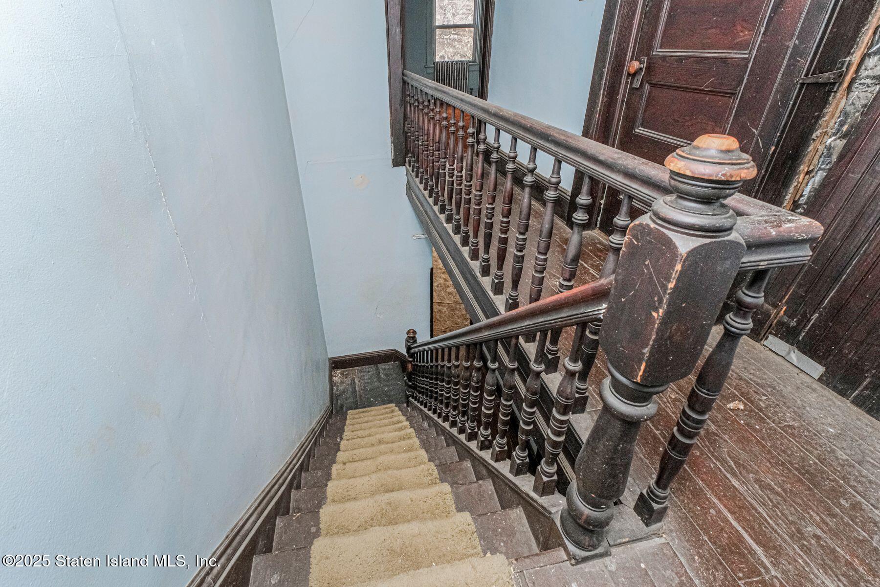316 Sherman Street Brooklyn, NY 11218 - Photo 18 of 26 a view of entryway with wooden floor