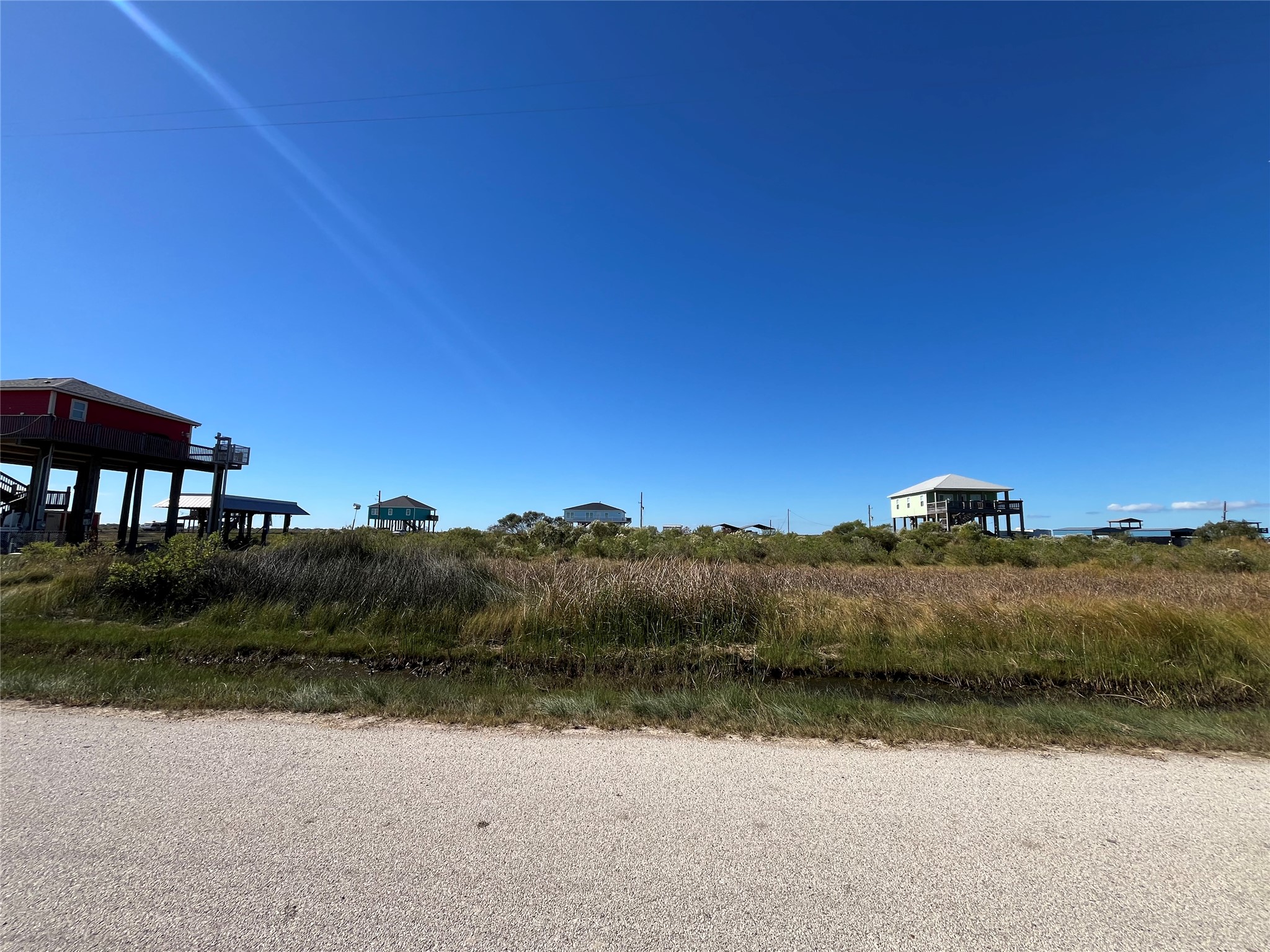 a view of a lake in middle of forest