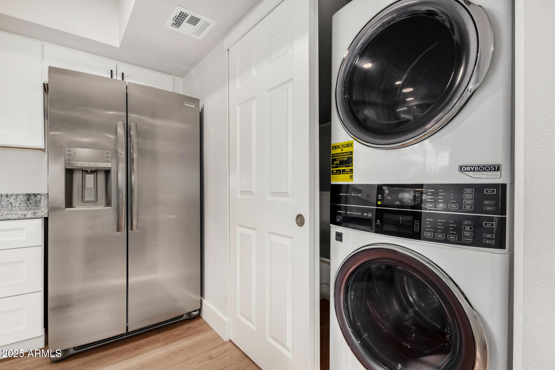 6027 North Granite Reef Road Scottsdale, AZ 85250 - Photo 20 of 29 a close view of a utility room with washer and dryer