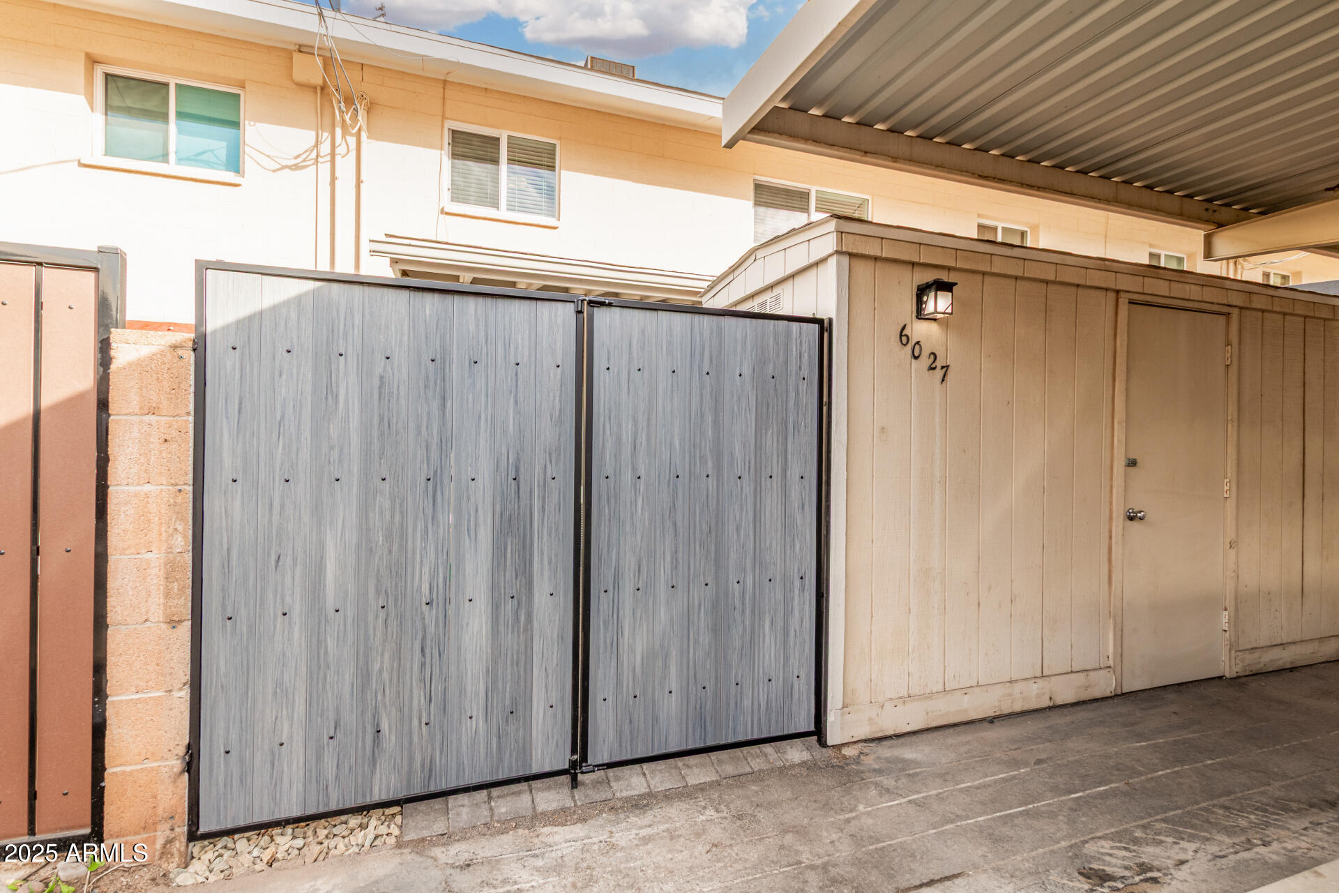 6027 North Granite Reef Road Scottsdale, AZ 85250 - Photo 23 of 29 a view of a wooden door