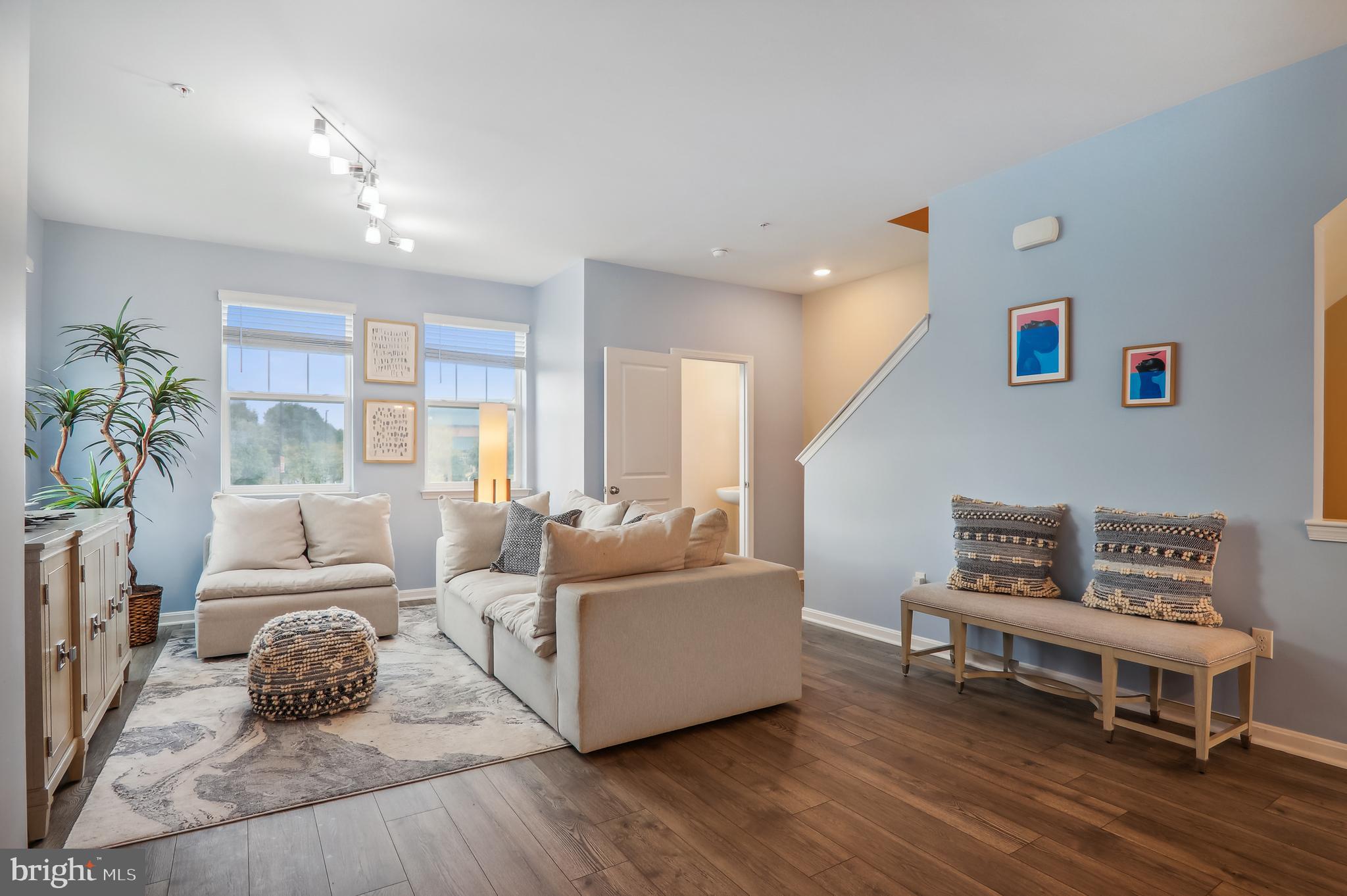 9826 Ruby Lockhart Boulevard Bowie, MD 20721 - Photo 5 of 43 Main level Living Room and Powder Room