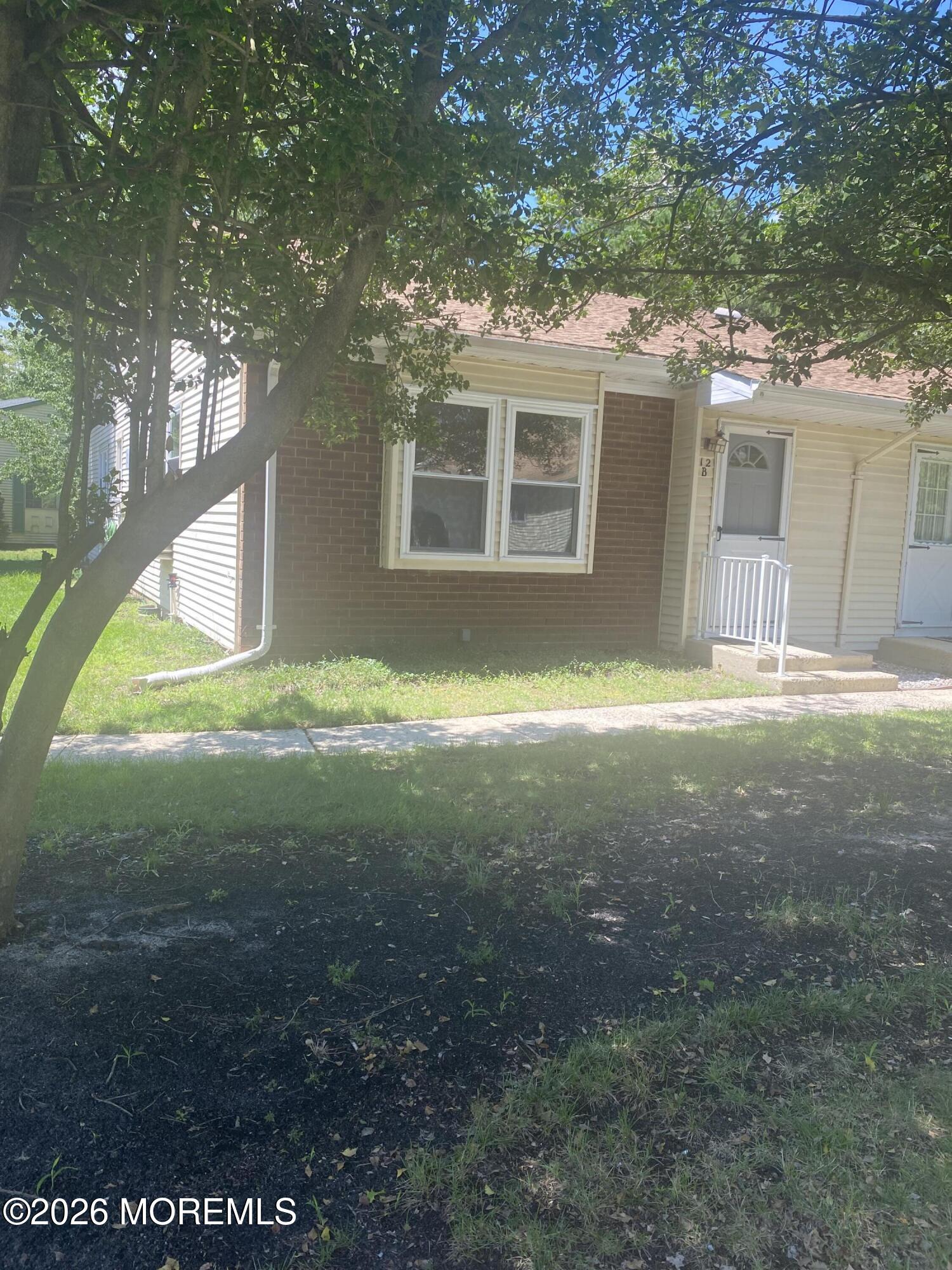 12 B Spring Street, Unit 50 Whiting, NJ 08759 - Photo 2 of 11 FRONT AND SIDE