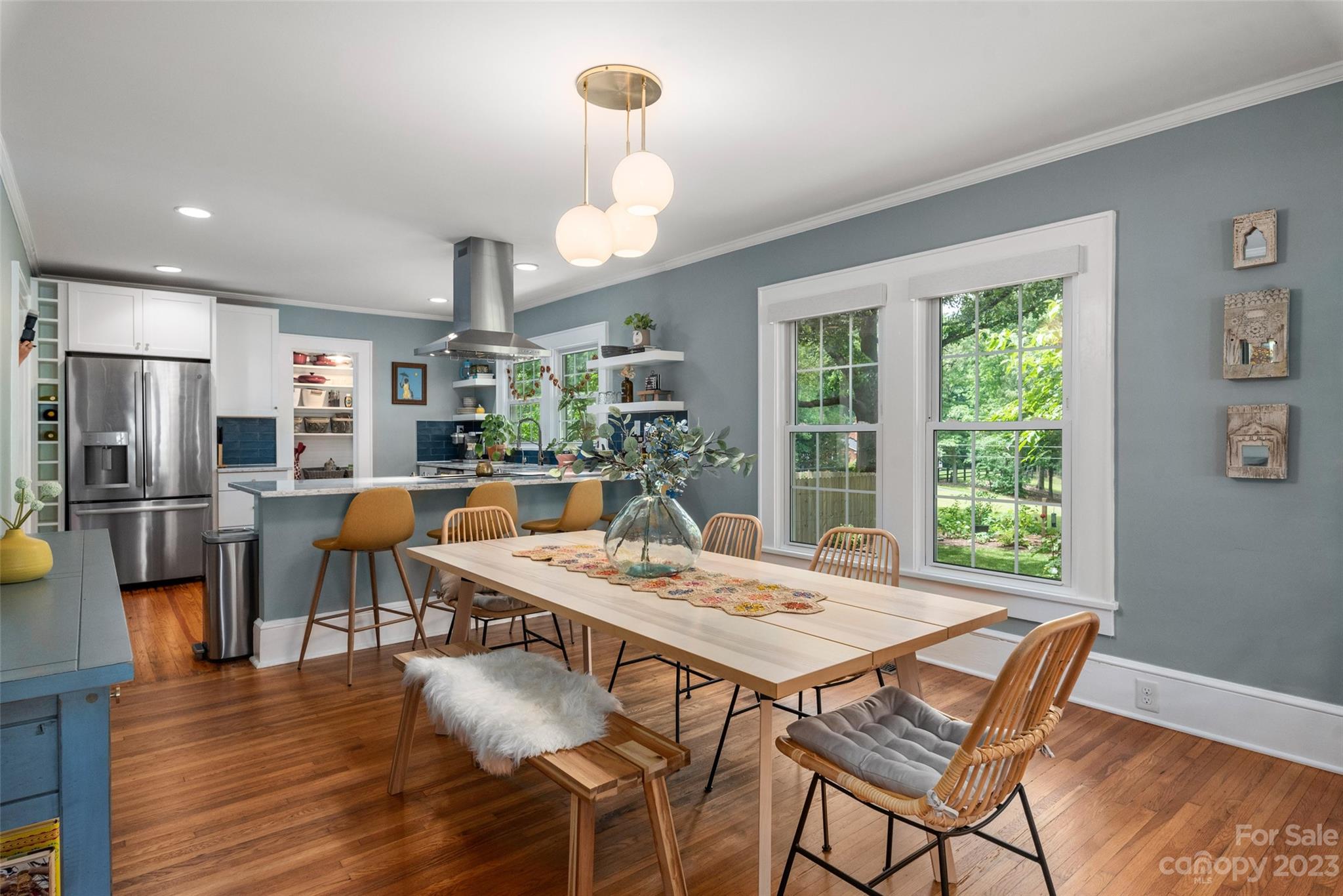 2901 Oakdale Road Charlotte, NC 28216 - Photo 11 of 48 a view of a dining room with furniture window and wooden floor