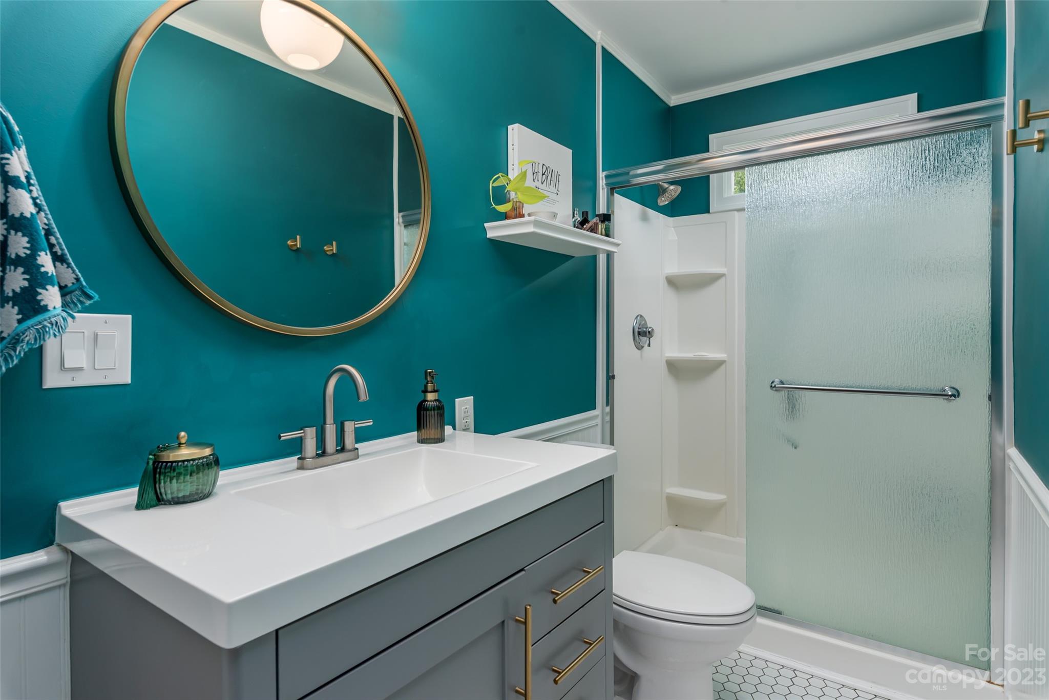 2901 Oakdale Road Charlotte, NC 28216 - Photo 23 of 48 a bathroom with a sink mirror toilet and vanity