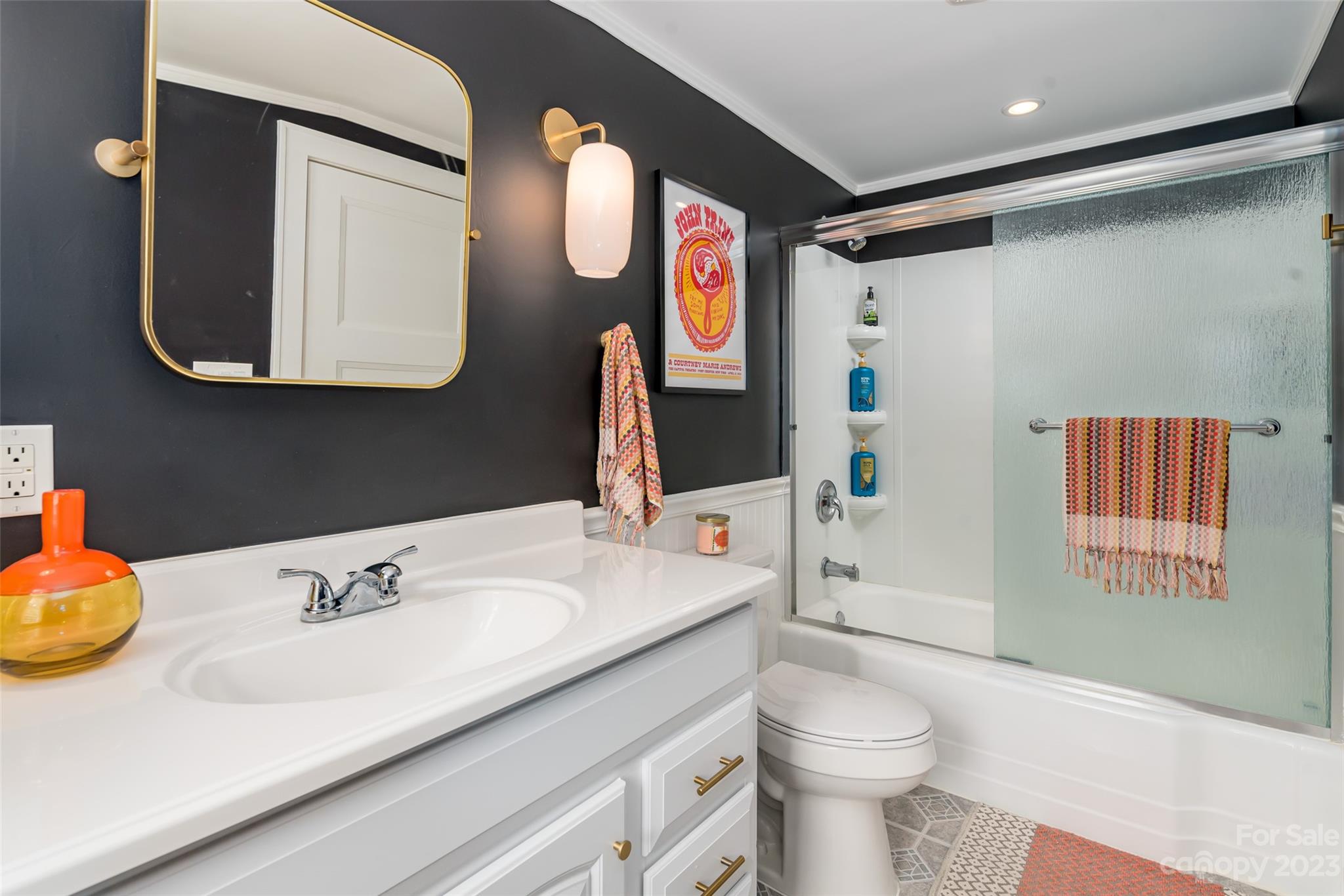 2901 Oakdale Road Charlotte, NC 28216 - Photo 25 of 48 a bathroom with a sink vanity mirror and toilet