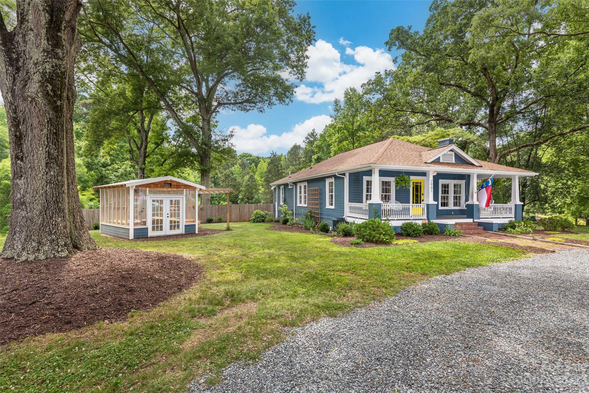 2901 Oakdale Road Charlotte, NC 28216 - Photo 27 of 48 a front view of a house with yard and green space
