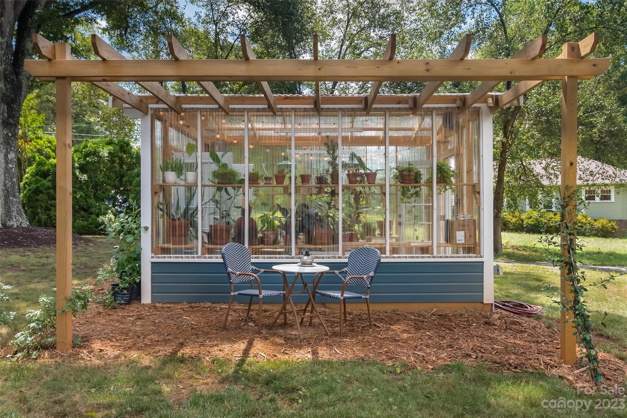 2901 Oakdale Road Charlotte, NC 28216 - Photo 32 of 48 a garden view with a seating space